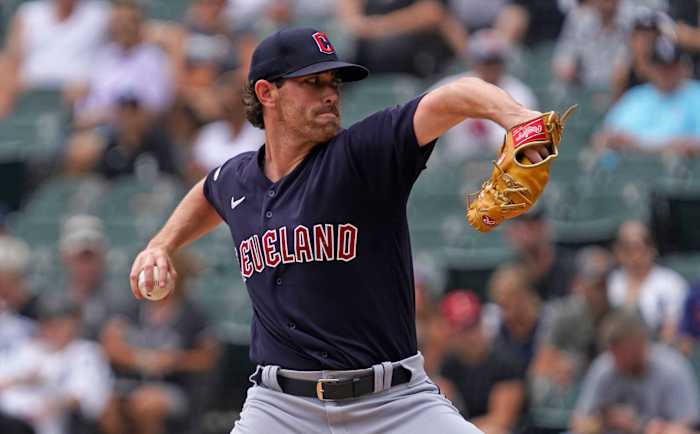 Caption: Jul 24, 2022; Chicago, Illinois, USA; Cleveland Guardians starting pitcher Shane Bieber (57) throws the ball against the Chicago White Sox during the first inning at Guaranteed Rate Field. Mandatory Credit: David Banks-USA TODAY Sports